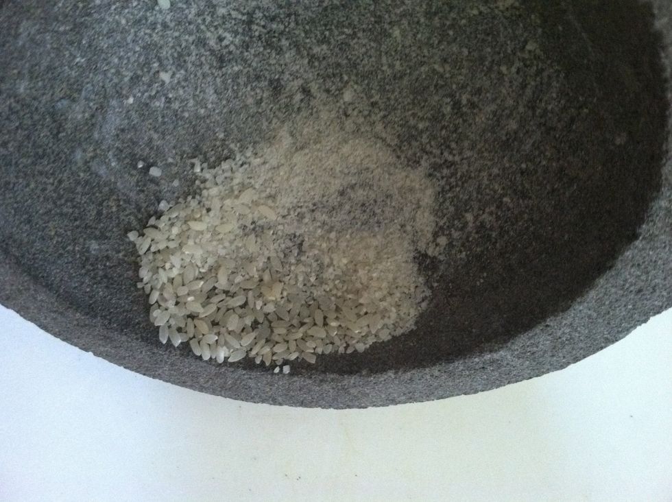Grind the rice grains against the sides of bowl