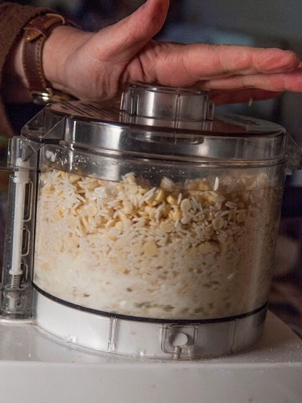 Grind together the rice and dals.