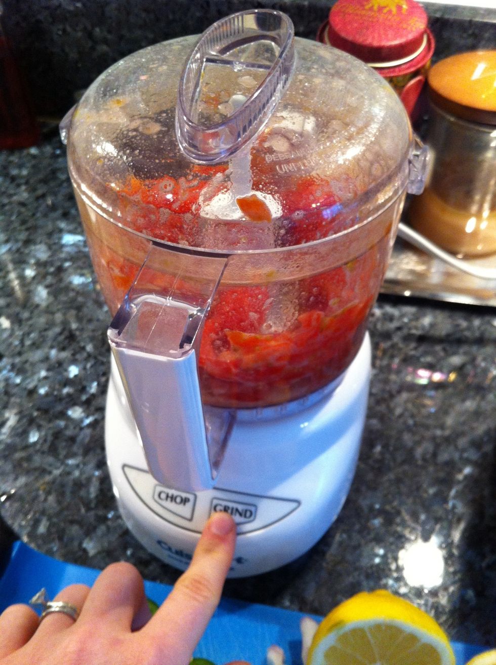 Grind up tomatoes in food processor