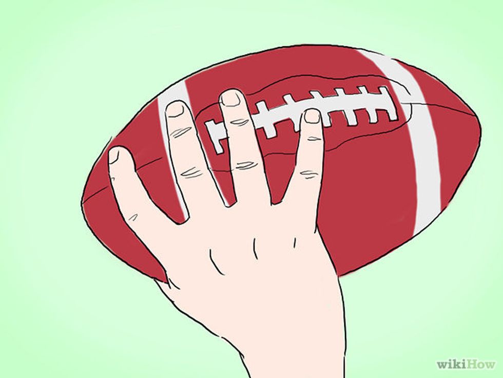 How to throw a tight spiral with a football) B+C Guides