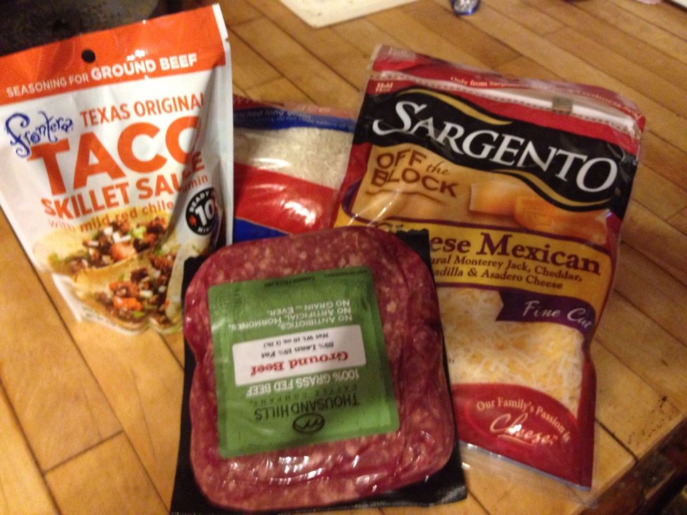 Ground beef, cheese, rice, and taco seasoning.