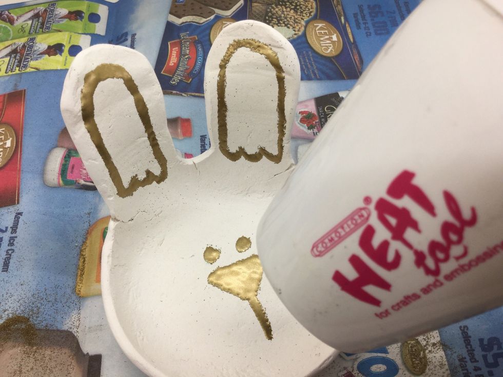 GROWN UP HELP REQUIRED: Use your heat gun to melt the embossing powder. Keep the bowl on a heat resistant surface during this step to avoid burning your fingers.