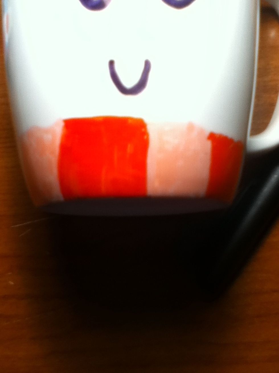 Gryffondor scarf in maroon and gold (I know these are not maroon and gold but I had none and had to improvise)