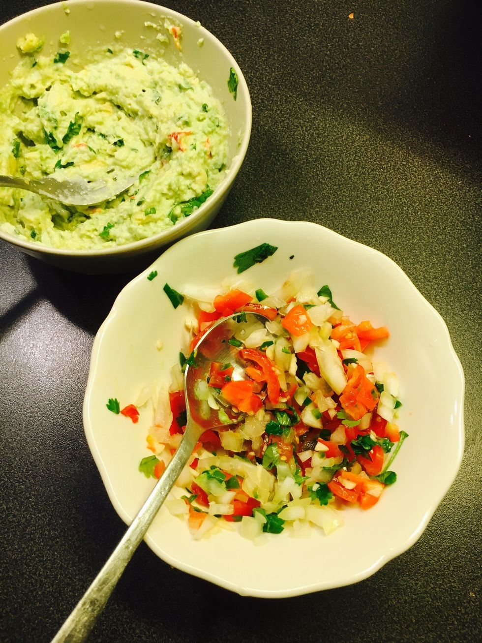Guacamole: mash avocado, mix w/red chilli, 1/2 of the garlic , 1/2 of the coriander and 1/2 the lime Salsa: mix the chooped tomatoes w/ onion, green chilli, 1/2 lime, 1/2 coriander, 1/2 the garlic