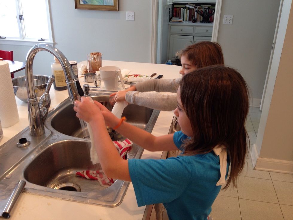 Hadley and Hildegard get some paper towels wet. I use the good kind so don't blame me if your cheap ones fall apart. You could also use a tea towel, but I don't.