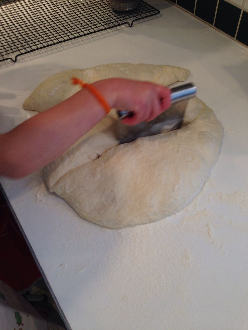 Hadley takes a turn. They don't have to be equal, as you'll see, because my oven heats so unevenly. Sorry Thermadore. The bread closest to the fan bakes way faster.