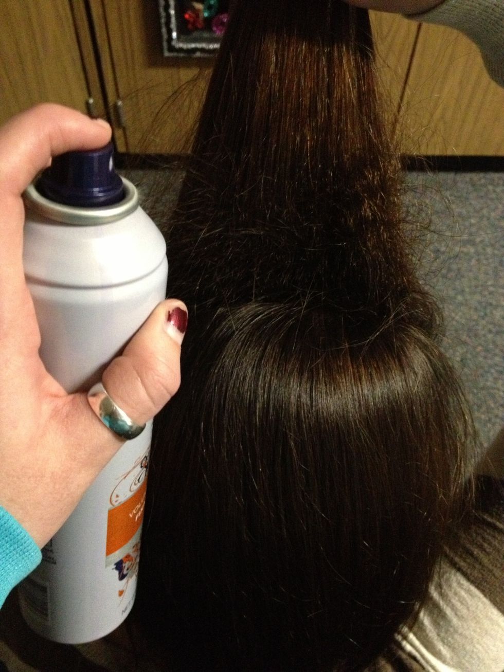 Hairspray but only a little NOT TOO MUCH onto the bottom part of the hair!