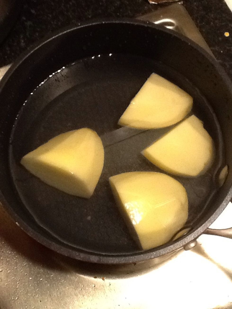 Half an hour before you want to eat put some potatoes in water. I am cooking for one here, so you will probably want more potatoes than this for two (I suggest 4)