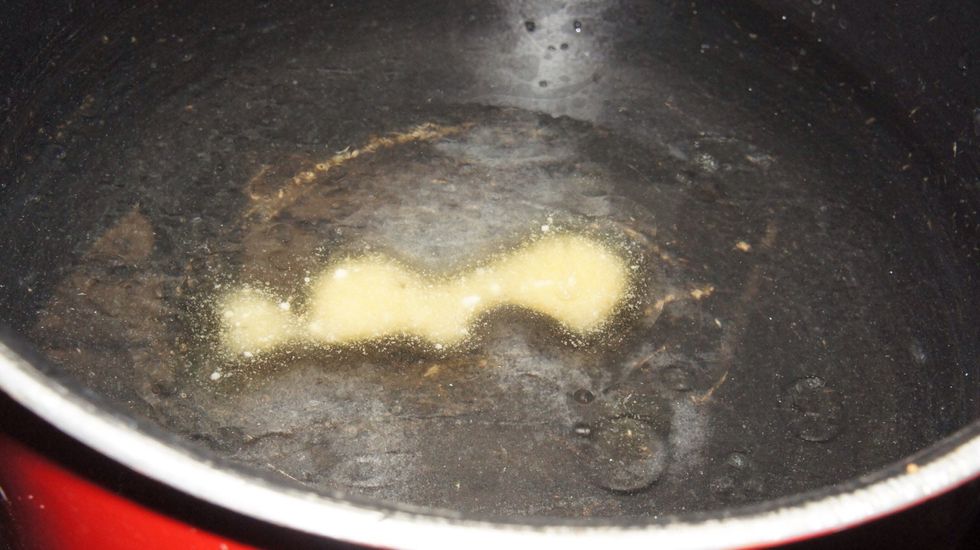 Half boil rice cooking process: take a pan and boil the water (9 cups), now add pure Ghee and pinch of salt to the boiling water.