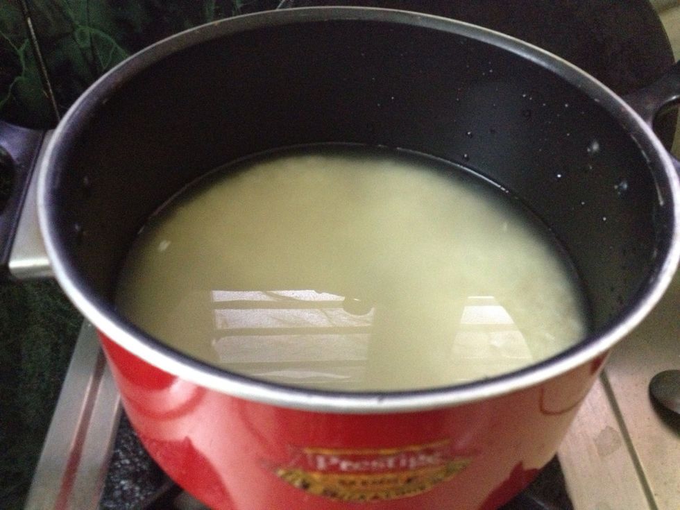 Half boil the rice with 1 tsp of ghee and pinch of salt..