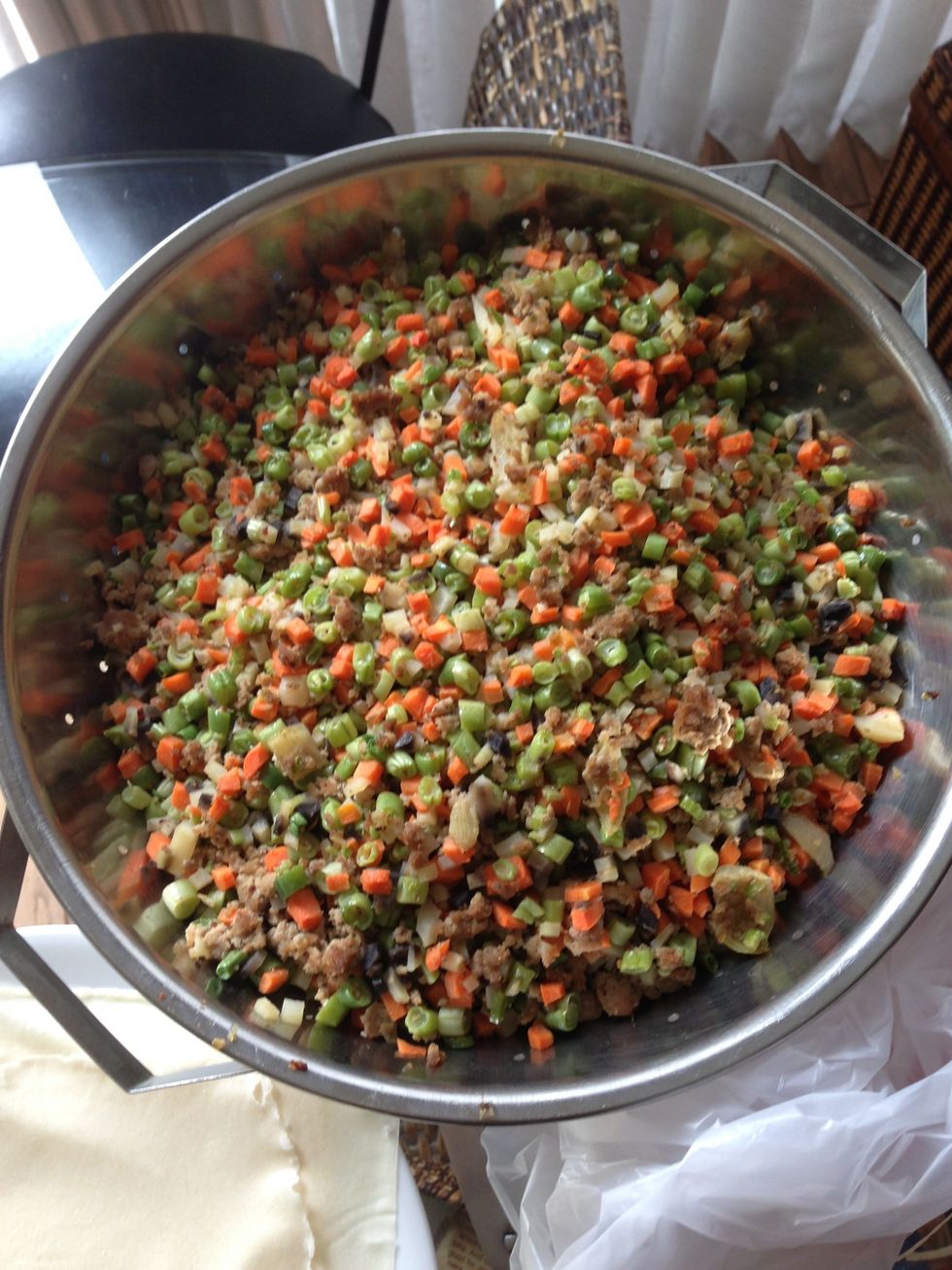 Half cook everything in a pot, let oil drain and cool in strainer