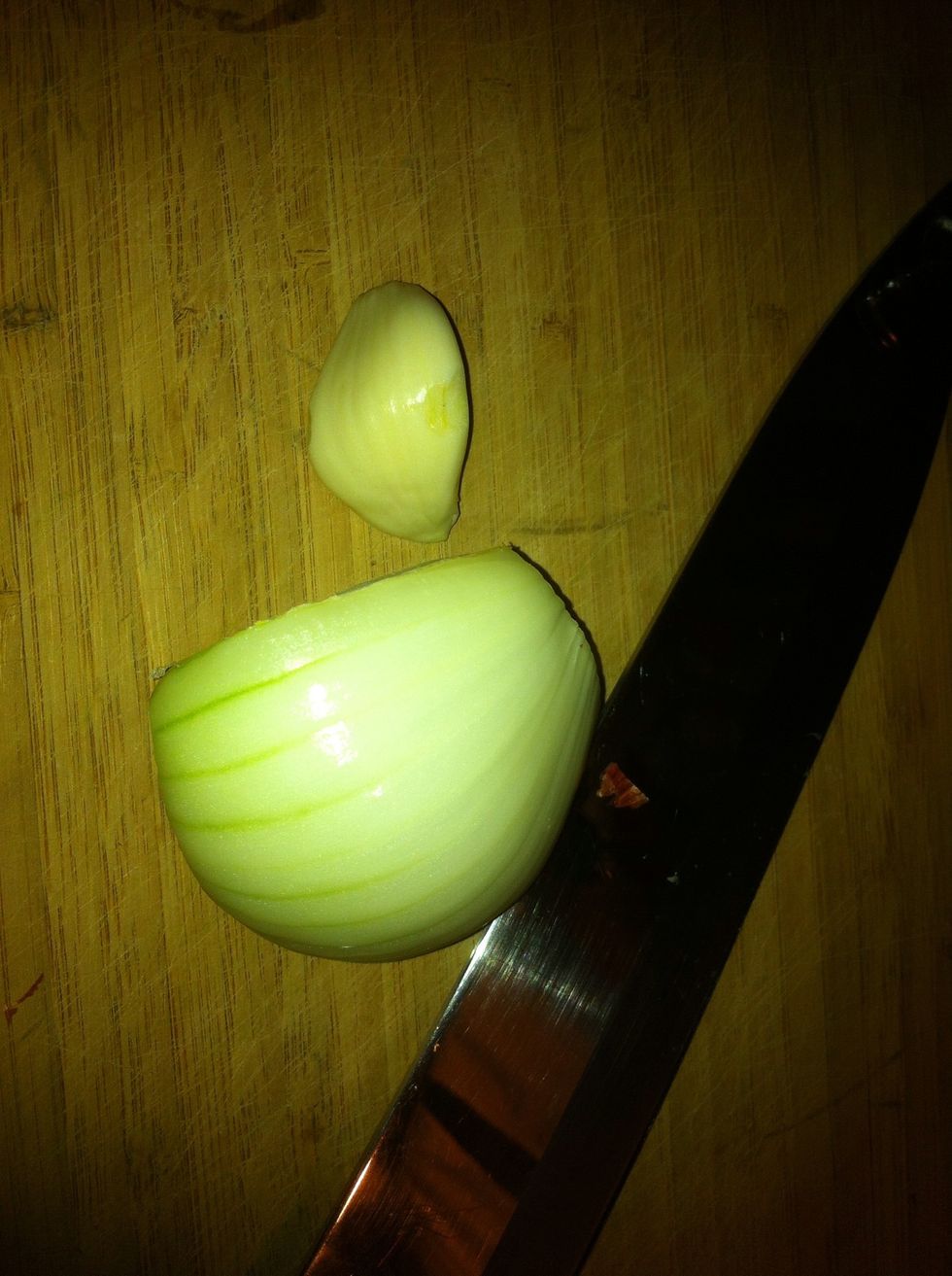 Half onion and clove of garlic....