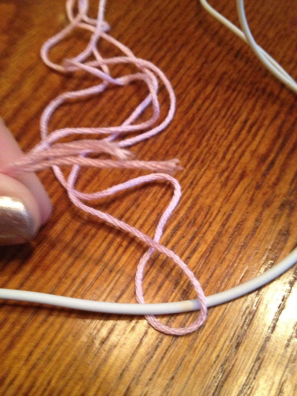 Half the floss around the cord