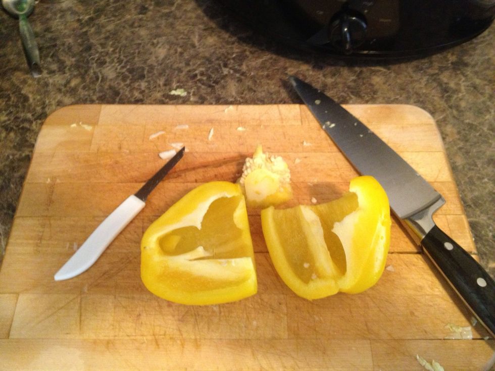 Half the pepper and clean out the white parts and the seeds.