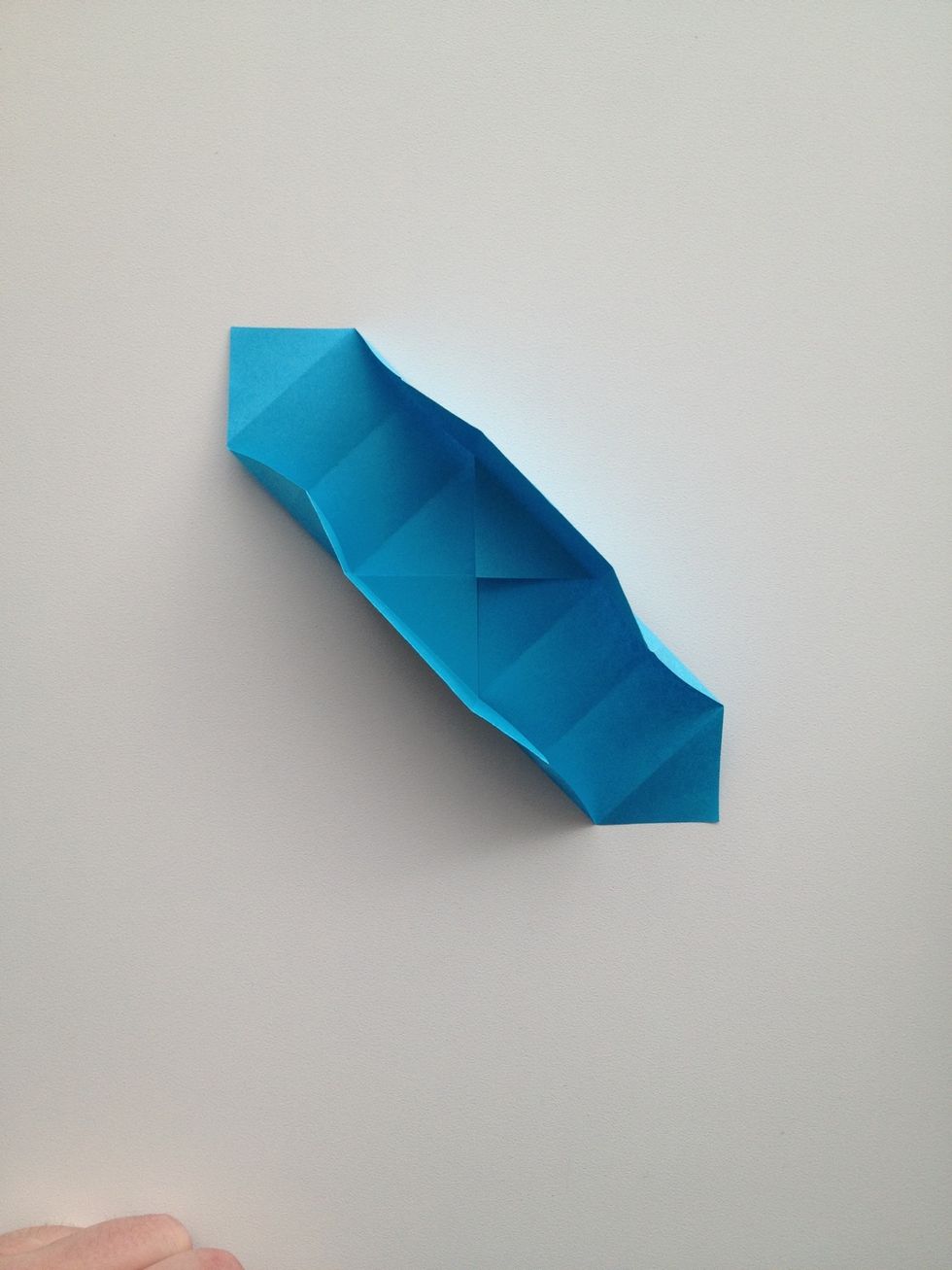 Half unfold the sides.