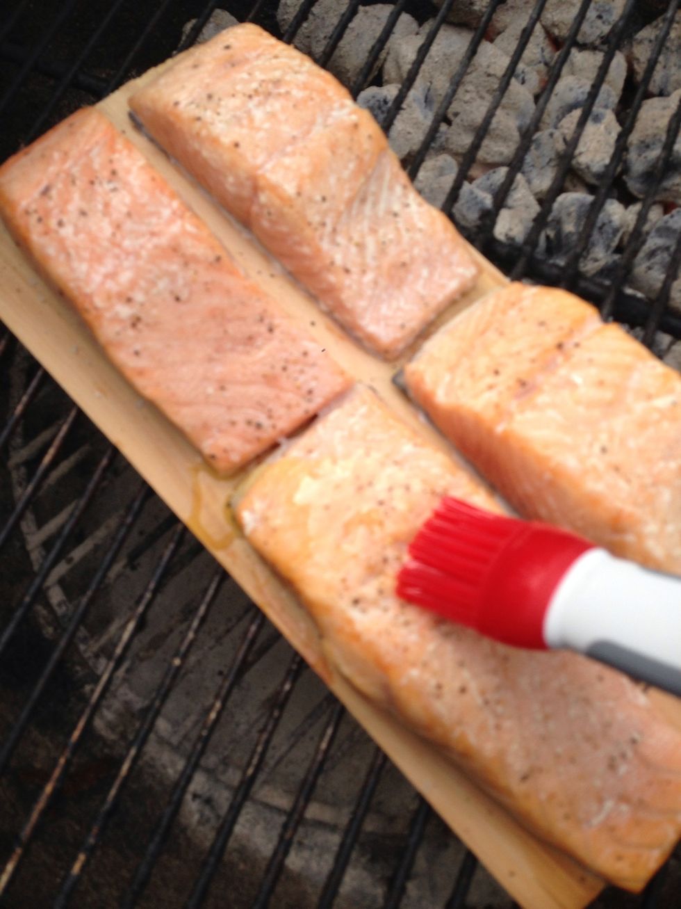 Halfway through the cooking time, about 8-10 minutes, brush more butter lemon mixture.