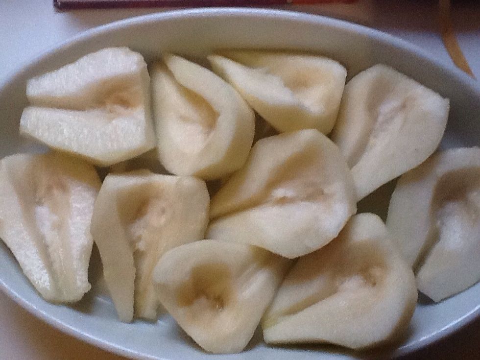 Halve, peel and core the pears and place in the buttered dish