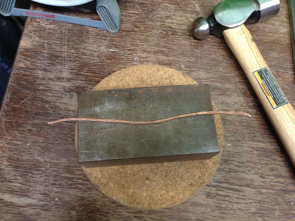 Hammering will distort the shape. You will want to straighten it out...