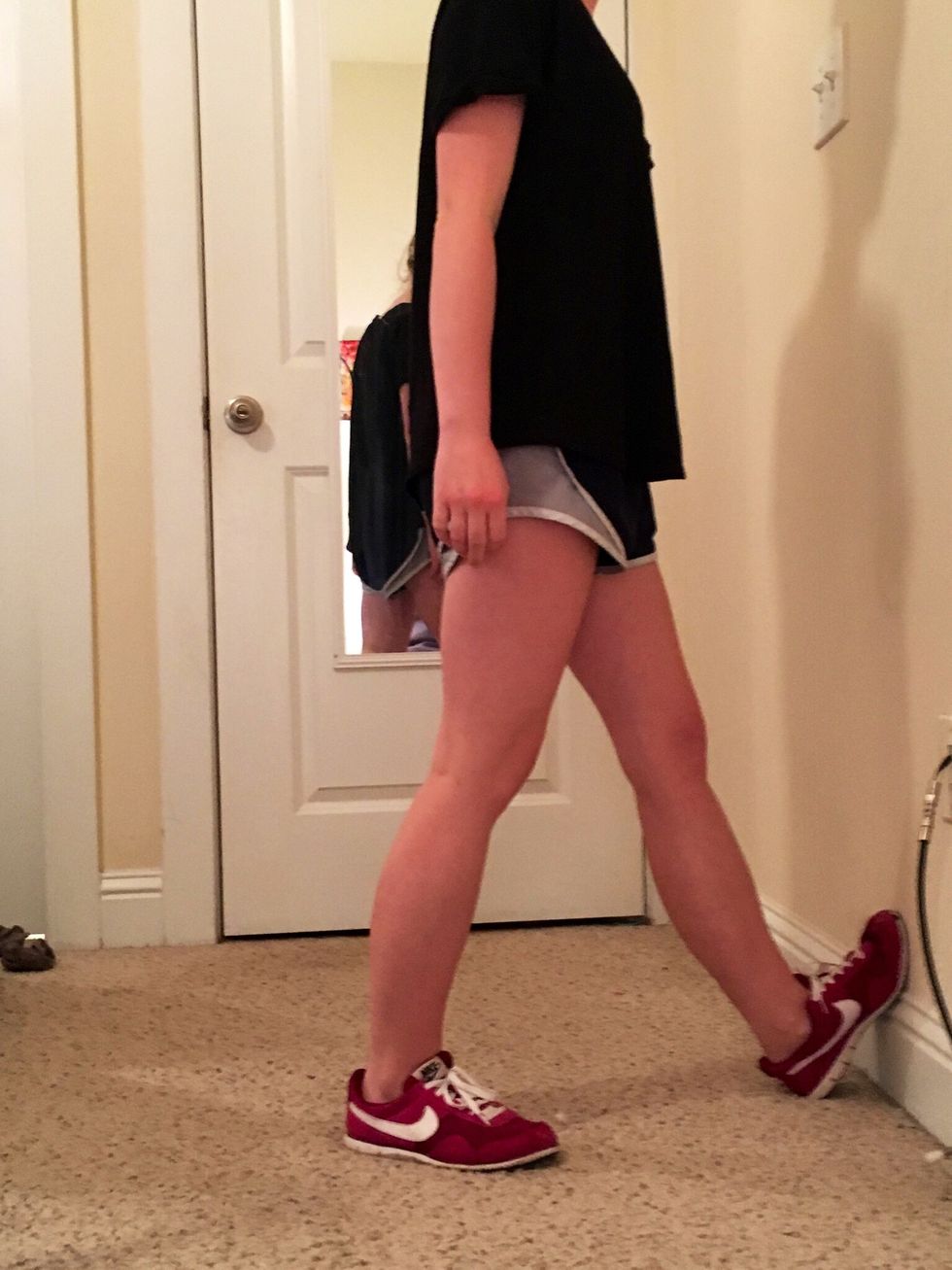 Hamstring Stretch: Put heel on ground and bend forward at the hips. Repeat on each leg.