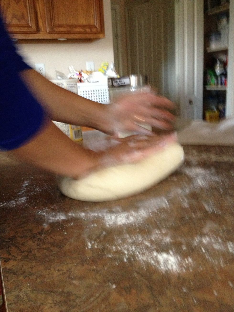 Hand mix the dough until soft and smooth.