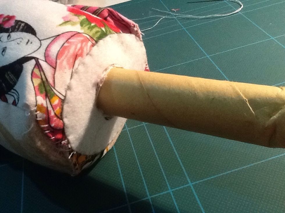 Hand stitch around to secure.