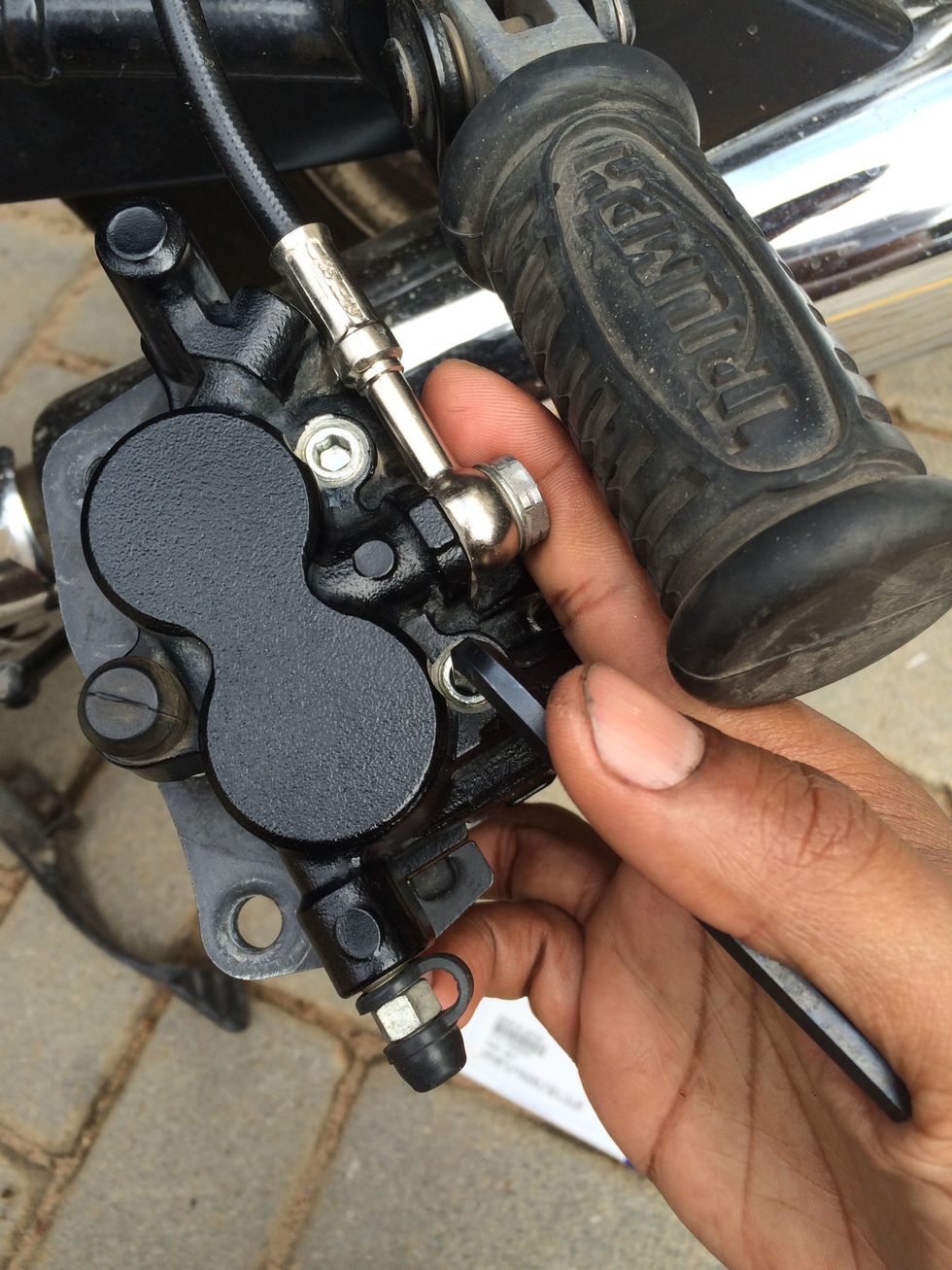 Hand tighten the retaining pins