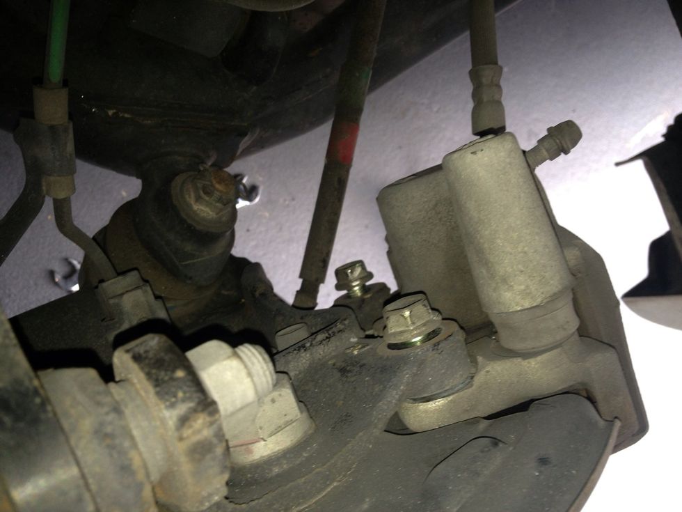 Hand tighten the top bolt first, then alight the bottom, then tighten both and put the wheel back on. Repeat the same steps for the other side. Total time took 30 min