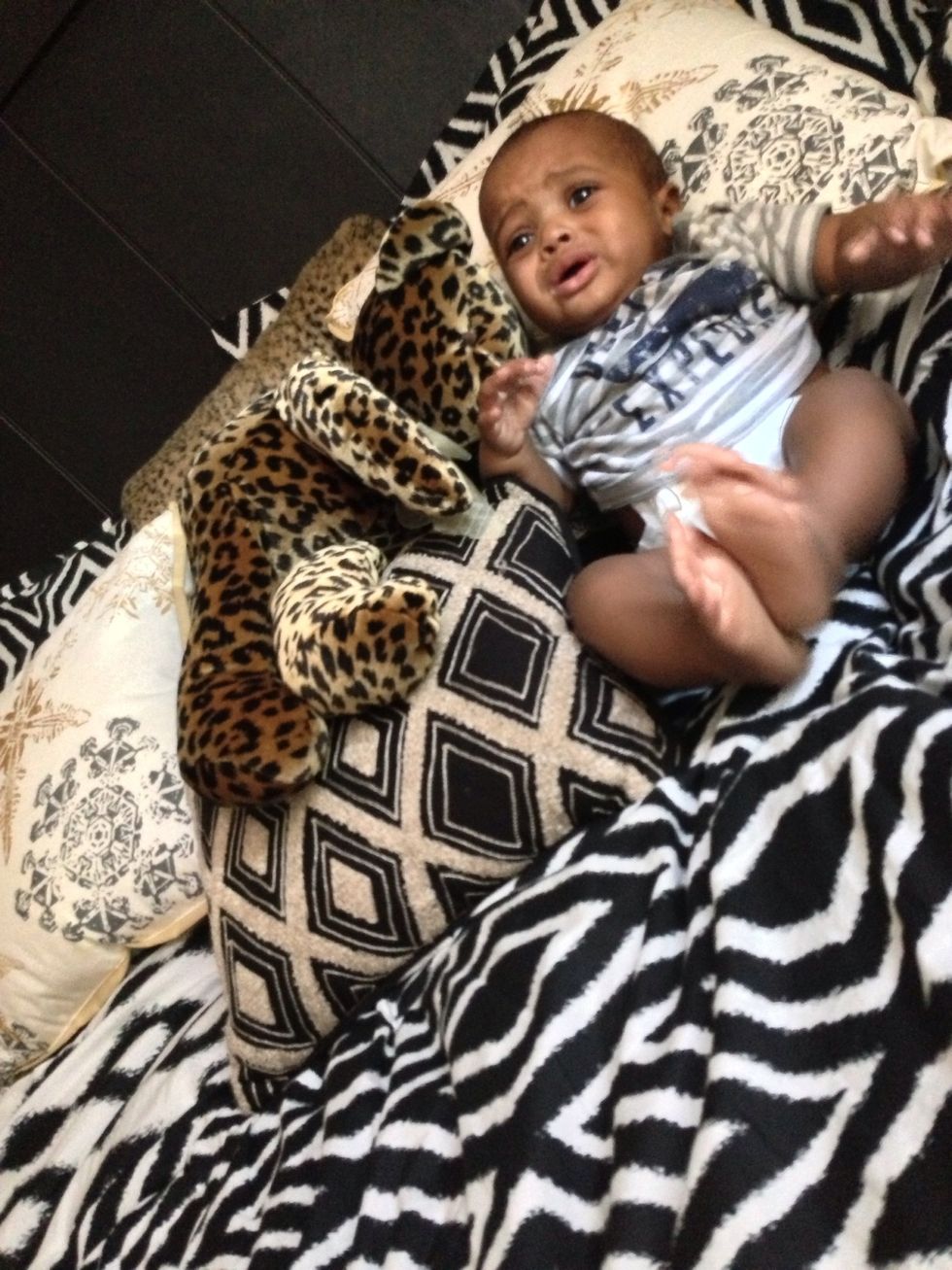 Handsome boy #2 and last lol he contribute to baby items you may see astray though out the pictures we are full time work and school parent saving up for a nice car(Dodge Charger) staying in a 1 bd/bt