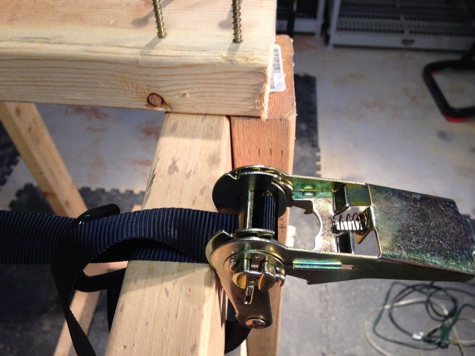 Handy tip: I was a bit out of square with the wood so I used a winch strap to pull the wood closer together till I could screw it down.