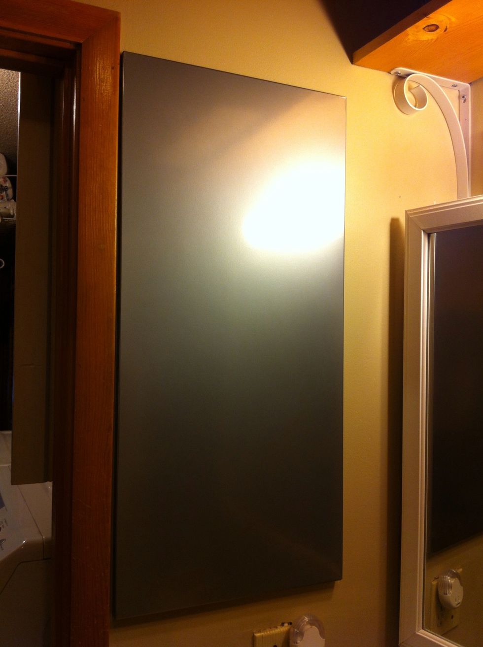 Hang a Metal Board in desired place.