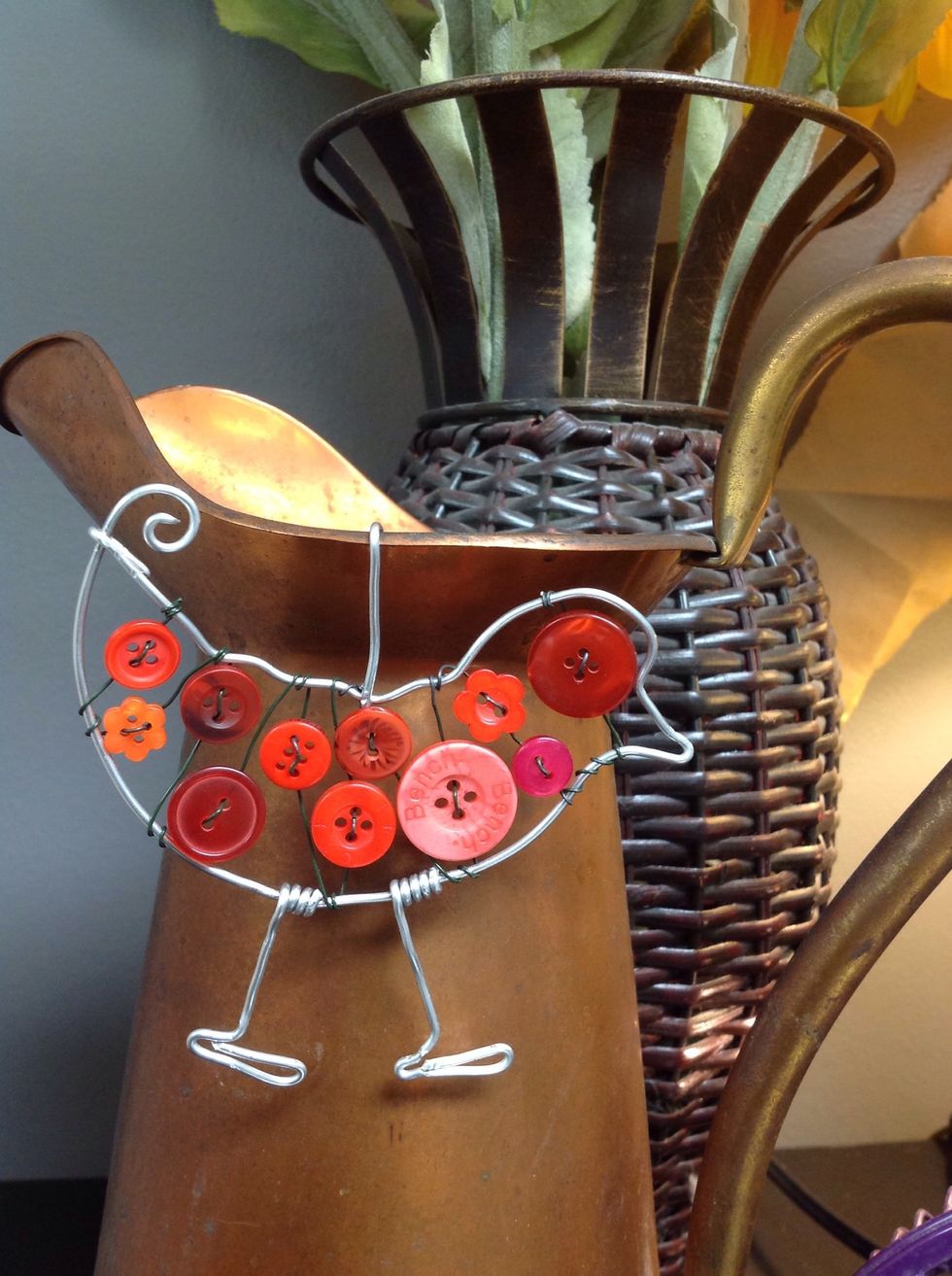 Hang from a flower pot, or wherever, to display.