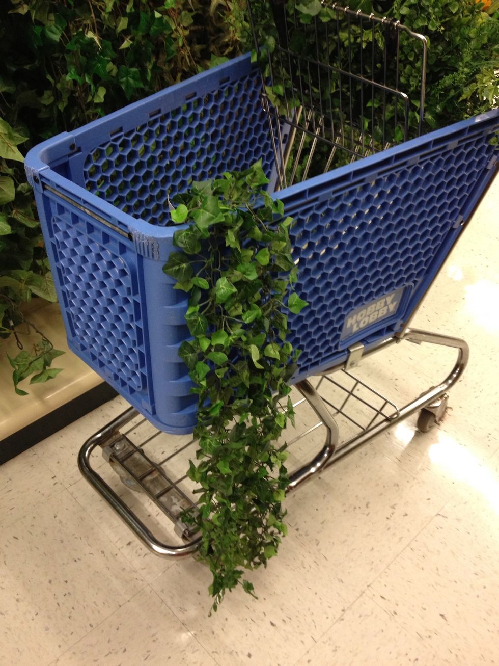 Hang "Garland Greenery 552802" with equal length on each side.