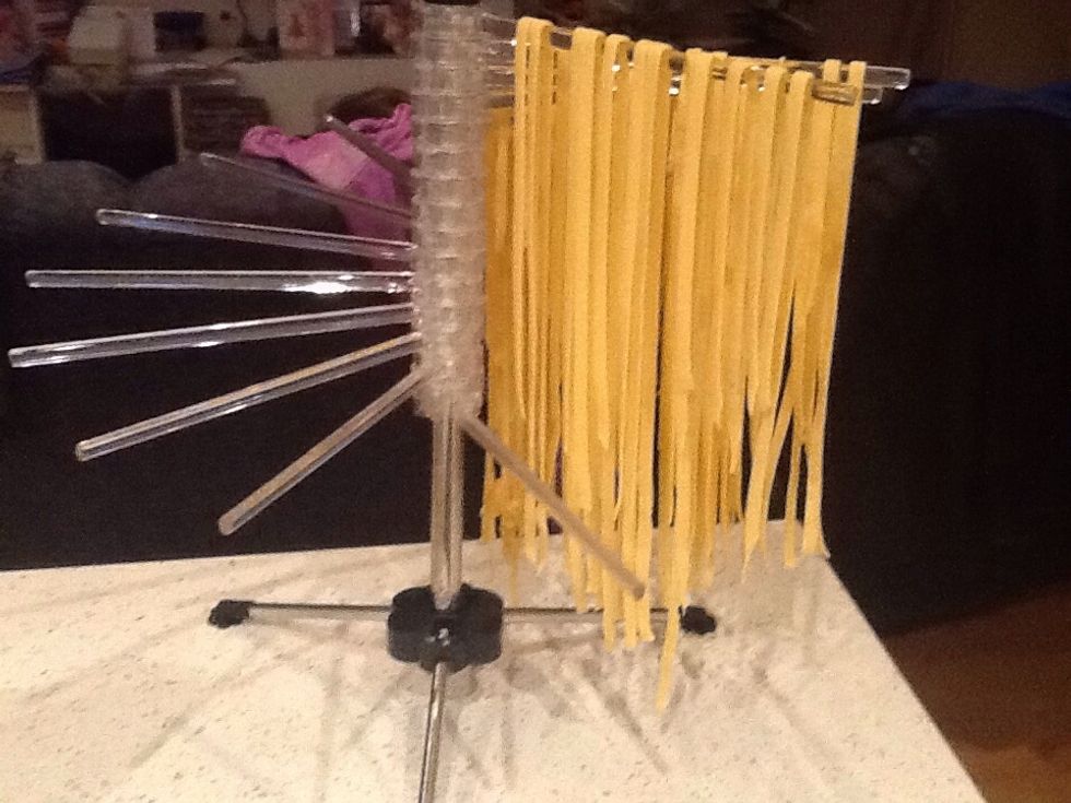 Hang the pasta on a pasta stand so they don't stick together.