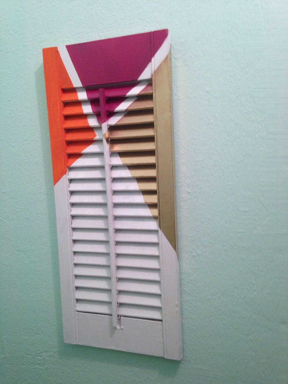 Hang the shutter on the wall