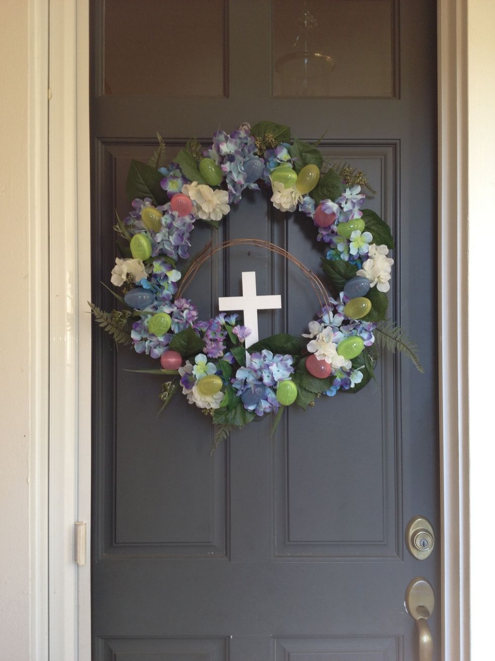 Hang the wreath in a place with plenty of light. Glow-in-the-Dark Egglo Eggs need to be charged with light to glow.