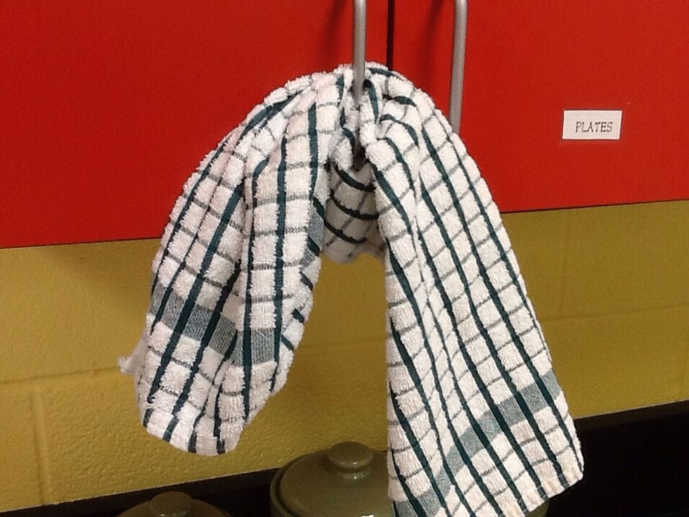 Hang up second towel for hand drying dishes.