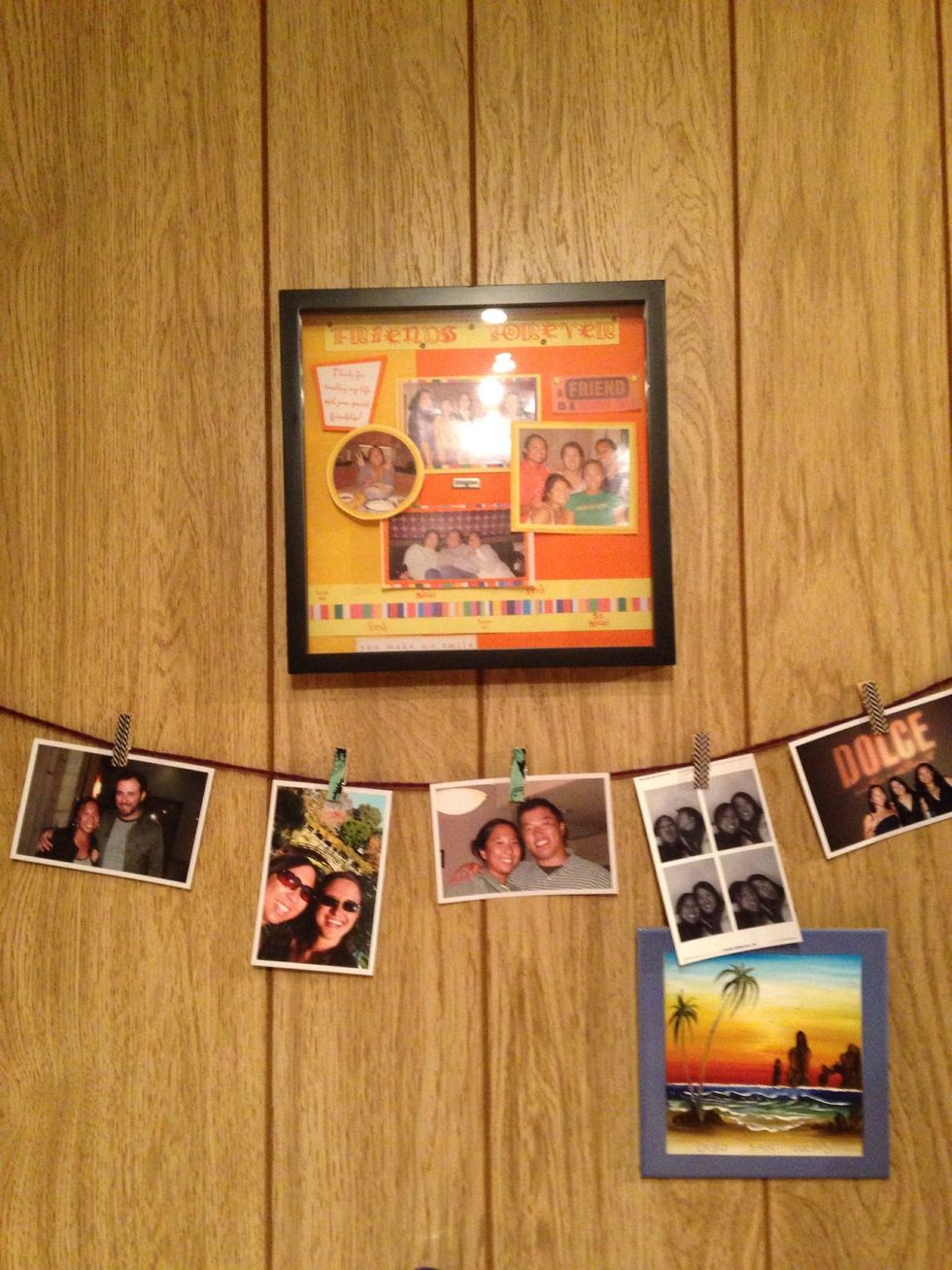Hang up with string and use the clothespins to hang pictures.