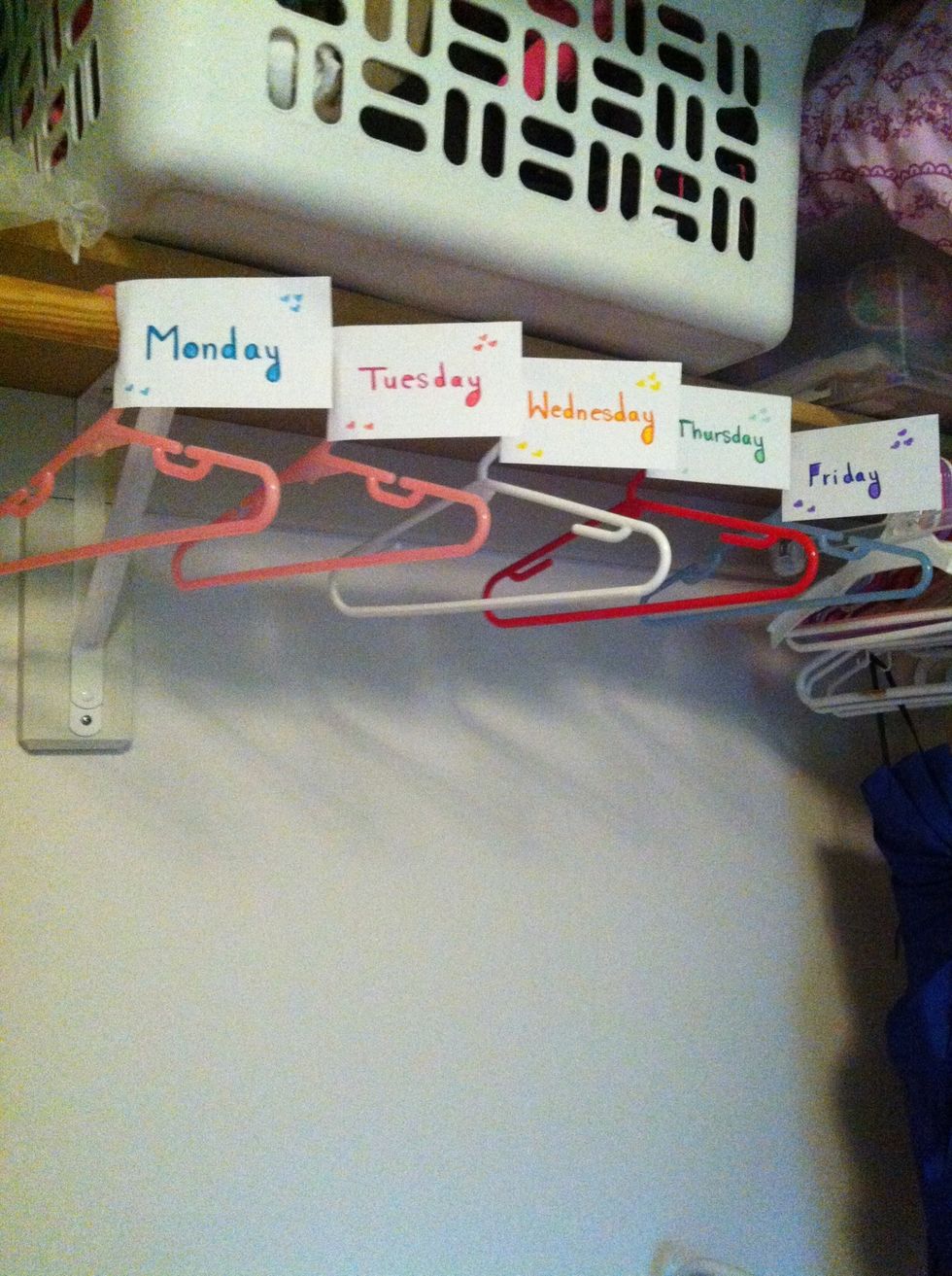 Hang your hangers and fold the cards back a little so you can see the days.