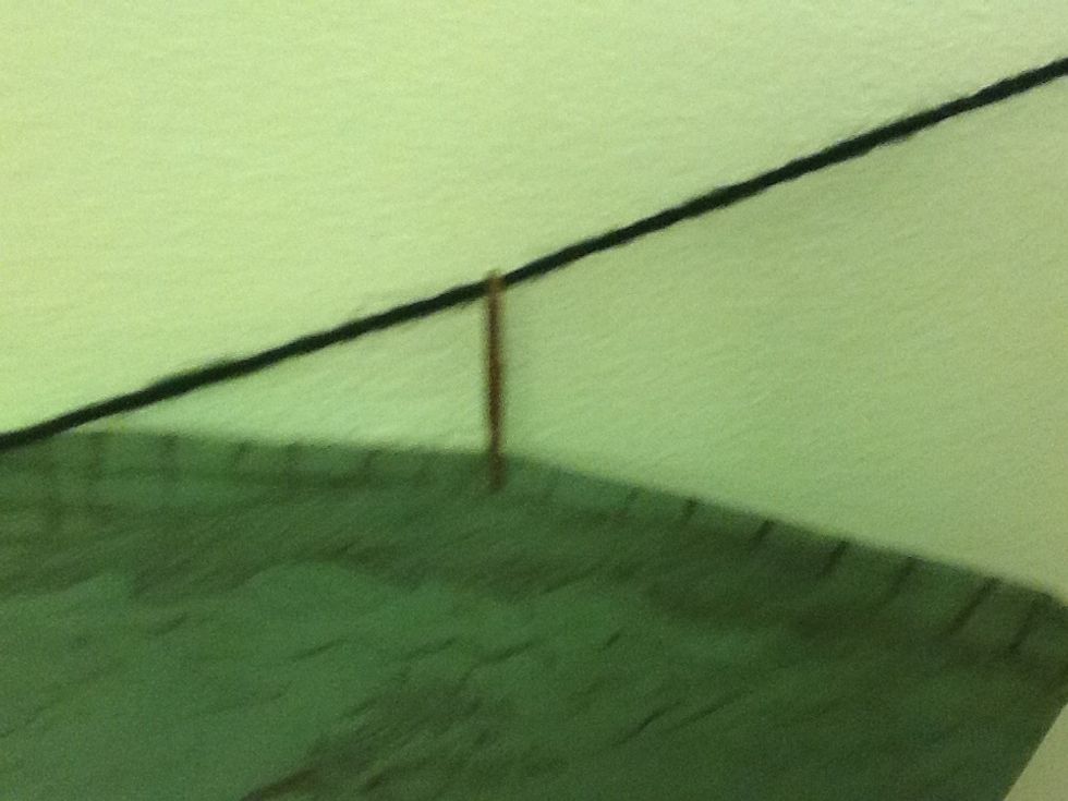 Hang your pictures up with the clips. I use paper clips because the picture always falls vertically.