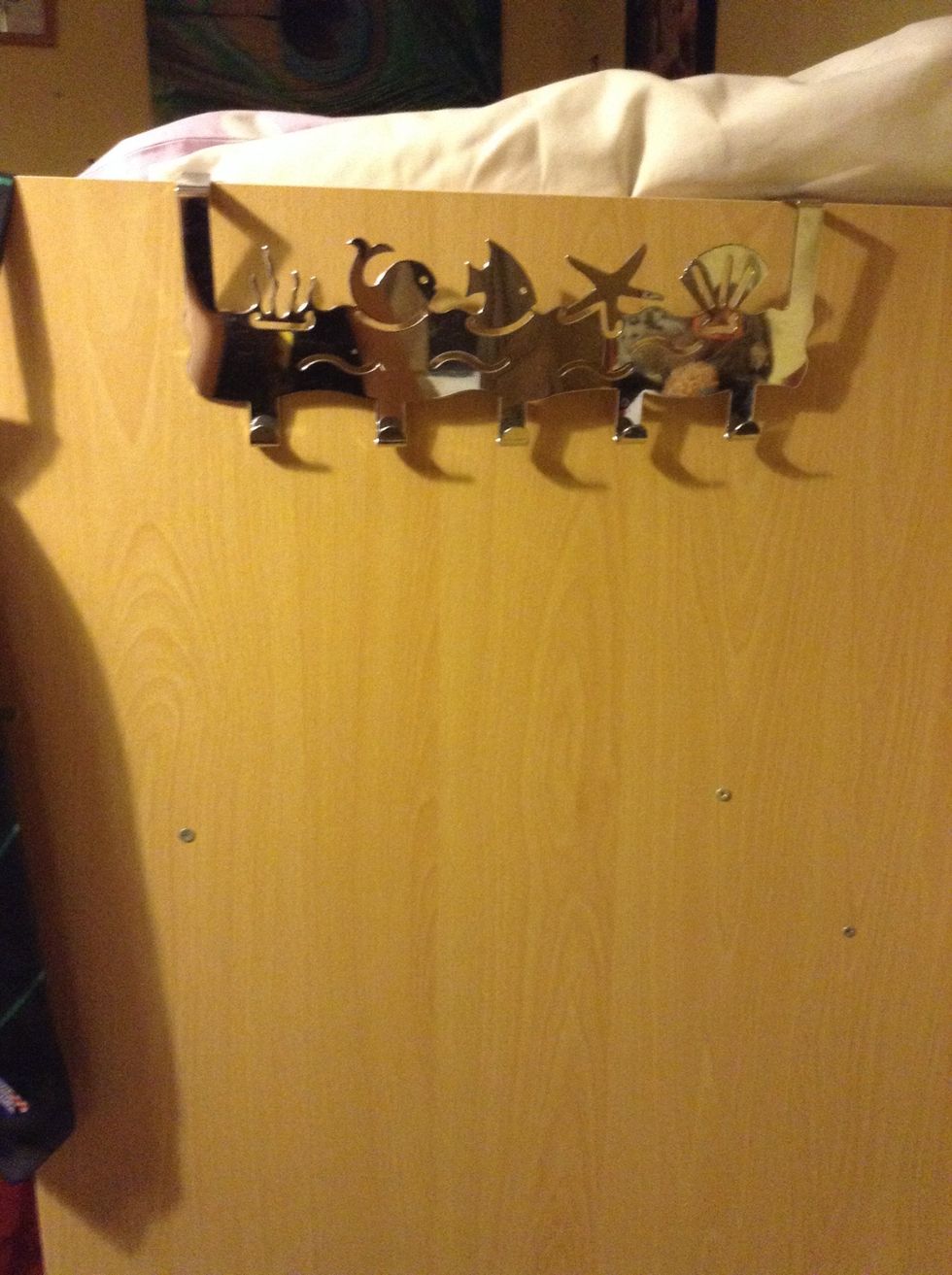 Hang your towel holder up, mine is hung up on the side of my bed