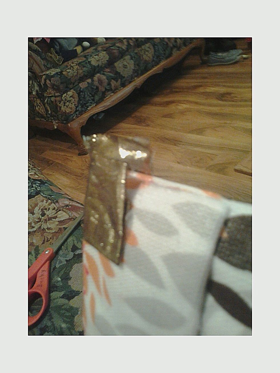 Hard to see again, sorry, but I cut (on the back side of the case) in until there was just a little edge on both the height and the width of the back side so that it could be folded and glued