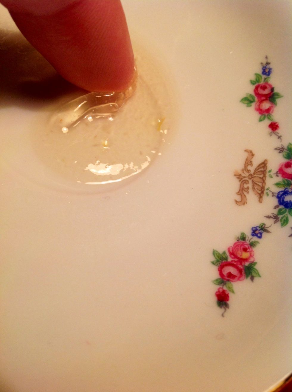 Have a saucer in freezer, when reduced, put a little on the cold plate. Leave for one minute. If it wrinkles when you push with your finger, it's ready to get into sterilised jars