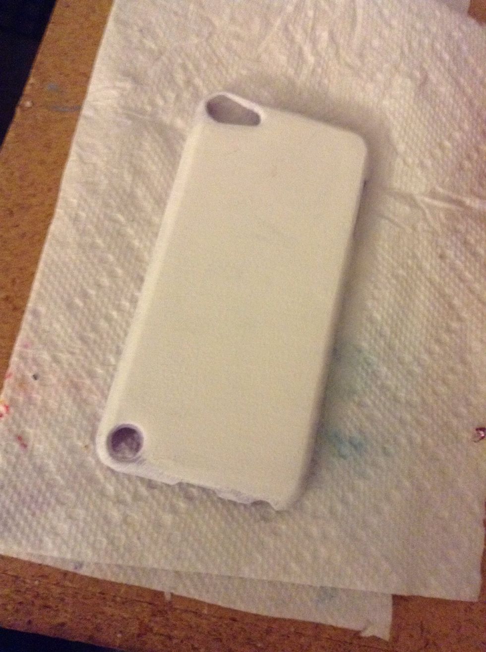 Have an old (in my case) iPod case. I painted mine with white acrylic paint, but it's totally unnecessary, I was going to do something else, then remembered- glitter is everything.