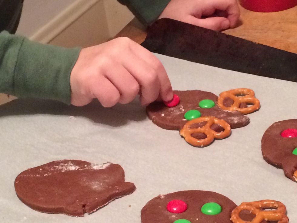 Have children press in 1 red M&M for nose