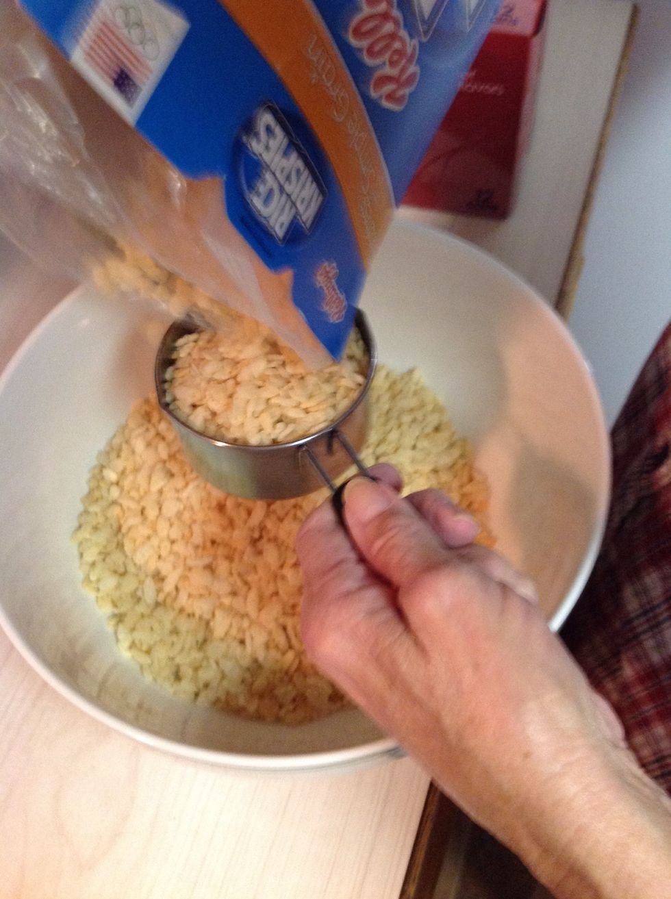 Have grandma measure out six cups of Rice Krispies.