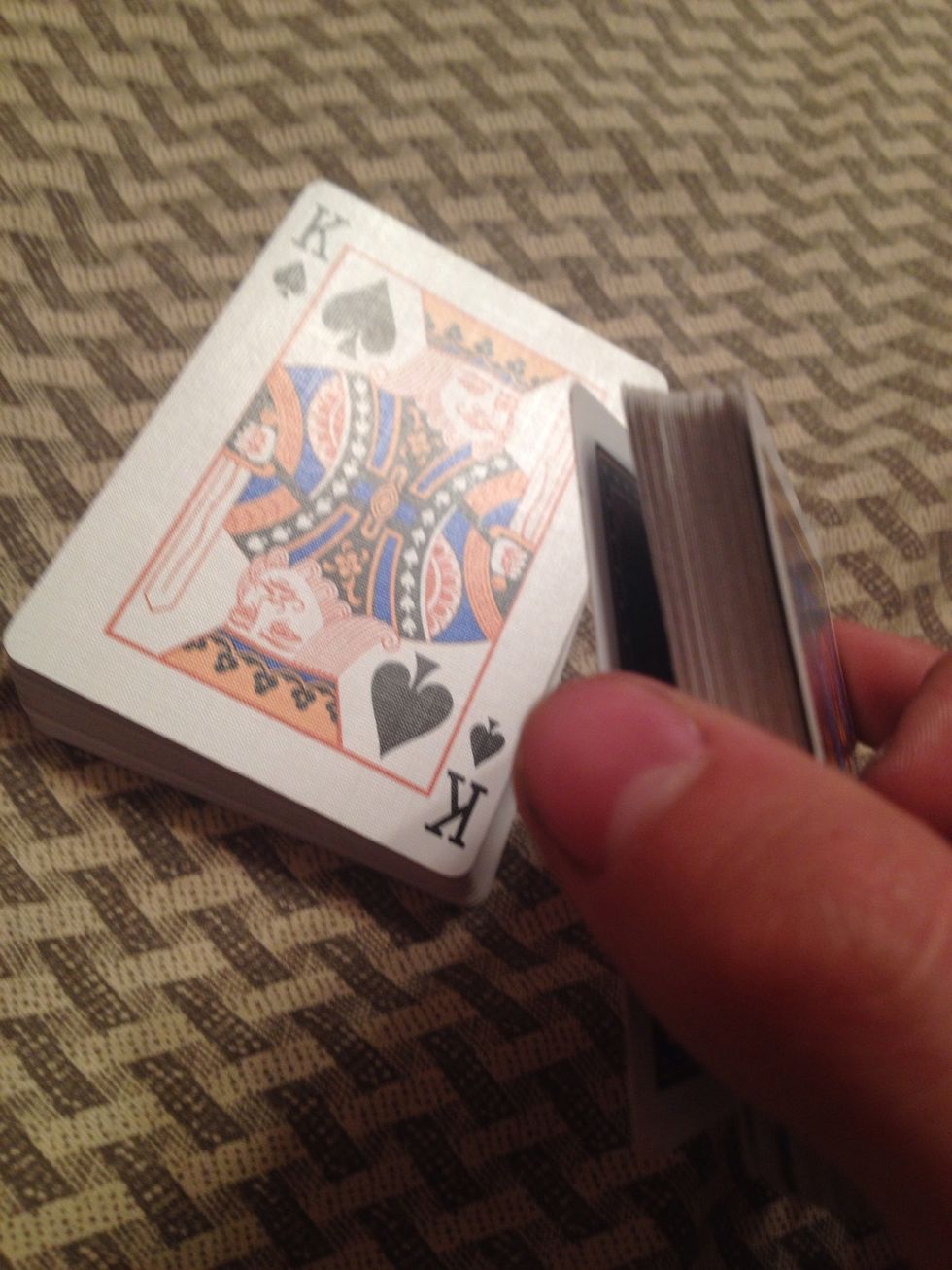 Have the spectator put their card on the pile without the pinky break. (Their card won't be face up)