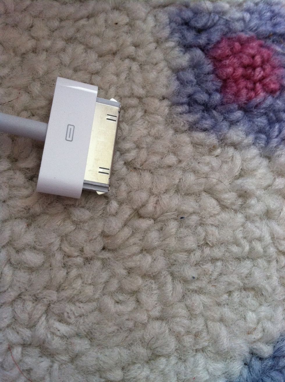 have your charger faced up with the drawn little box in the center facing you.