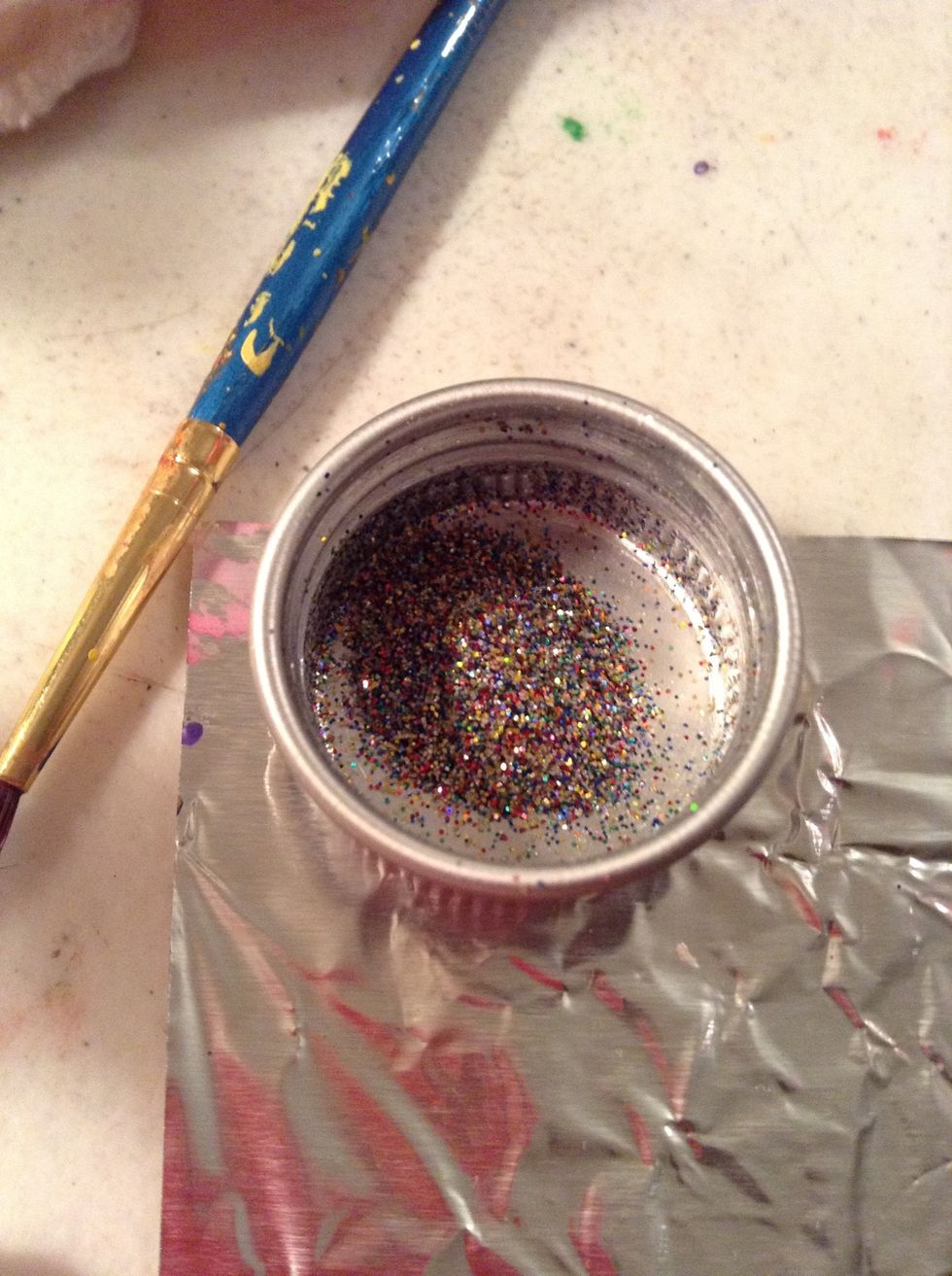 Have your glitter ready and a lil can go a long way ... And make a big mess so be careful and place tin foil or paper so clean up can be ez