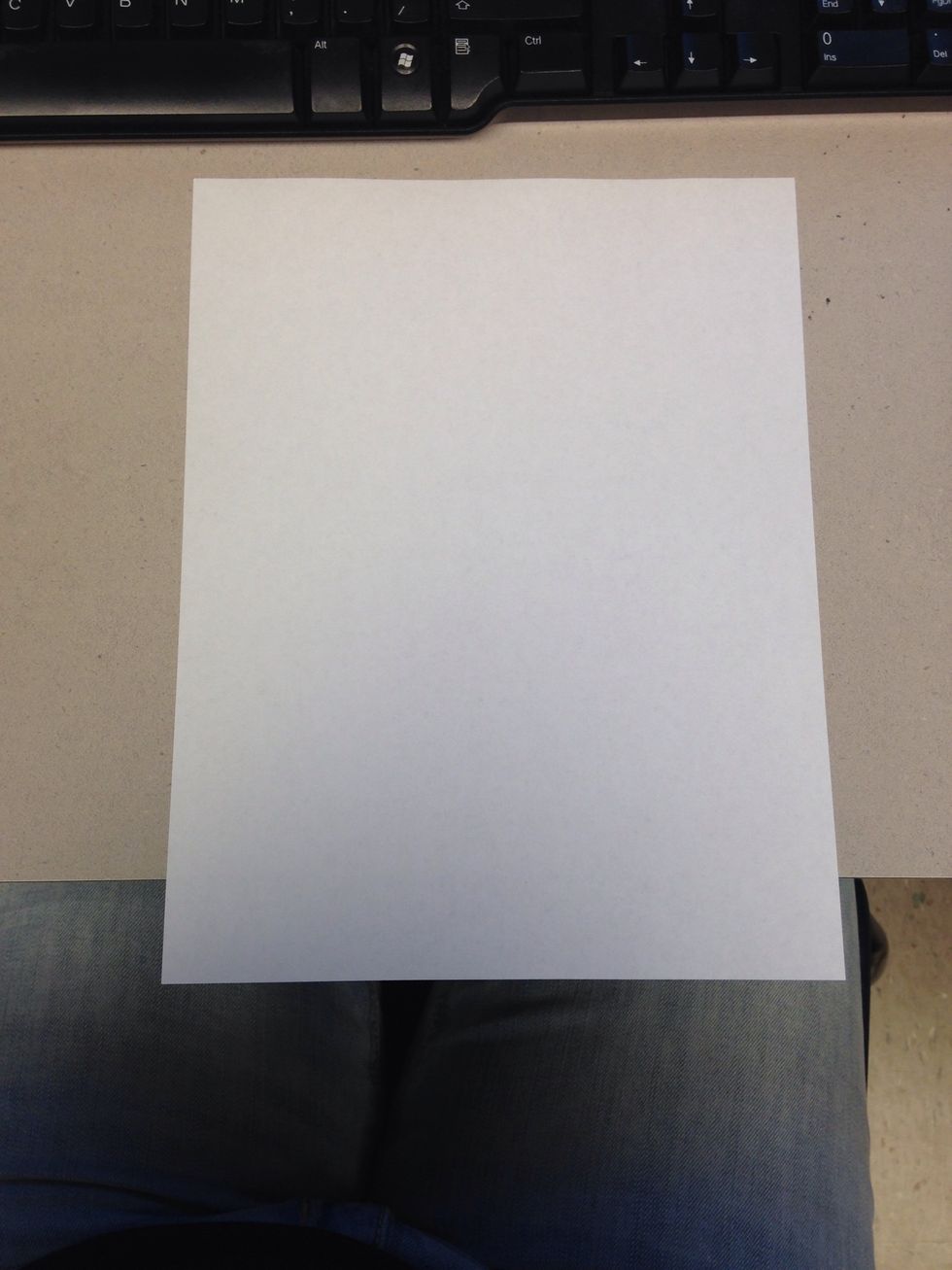 Have your printer paper laying on a flat surface to start.