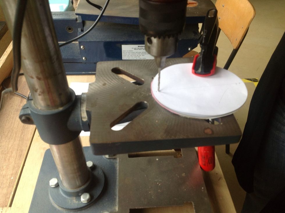 Have your teacher drill holes. Bring your template!